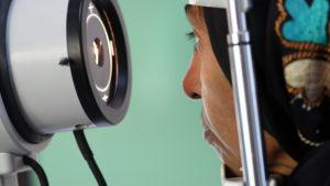 Close up of a lady having her eye examined.